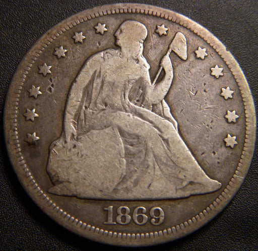 1869 Seated Dollar - Good