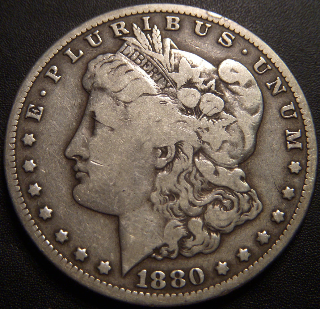 1880-CC Morgan Dollar - Very Good