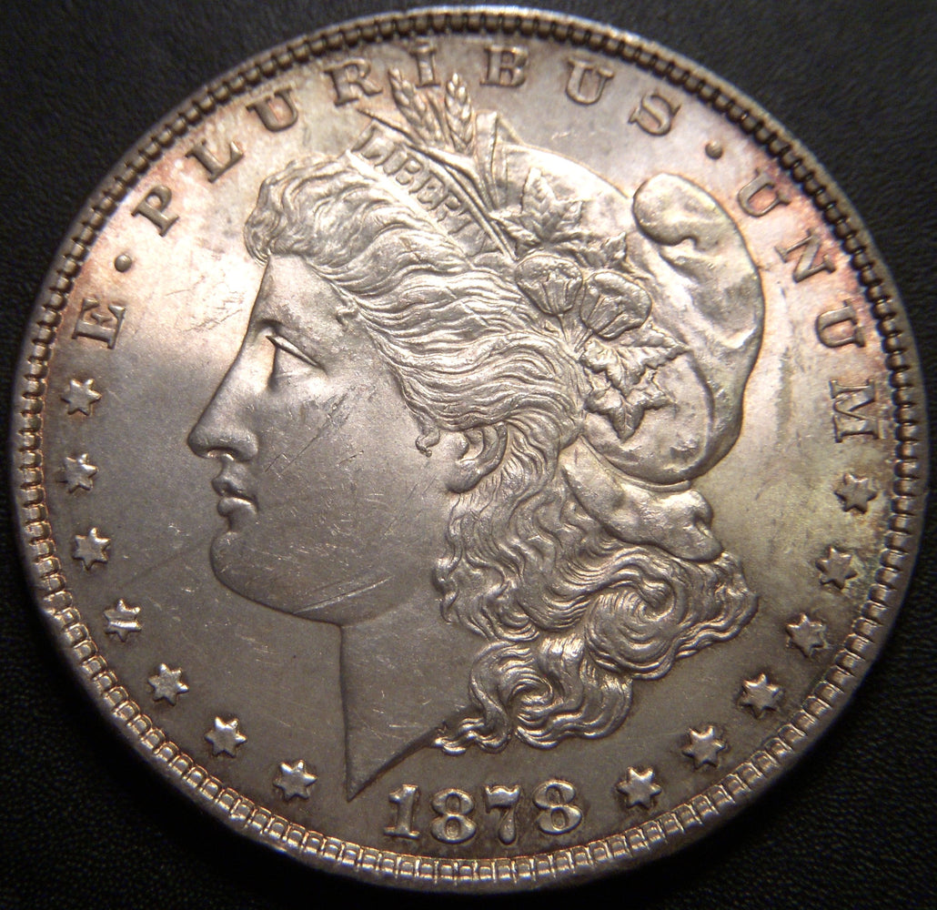 1878 Morgan Dollar - 7 Tail Feathers Uncirculated