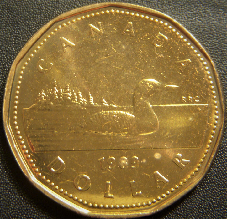 1989 Canadian $1 - VF or Better