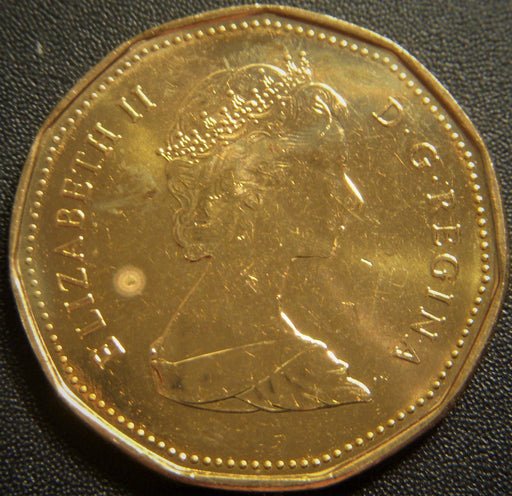 1989 Canadian $1 - VF or Better