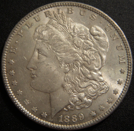 1889 Morgan Dollar - AU/Unc.